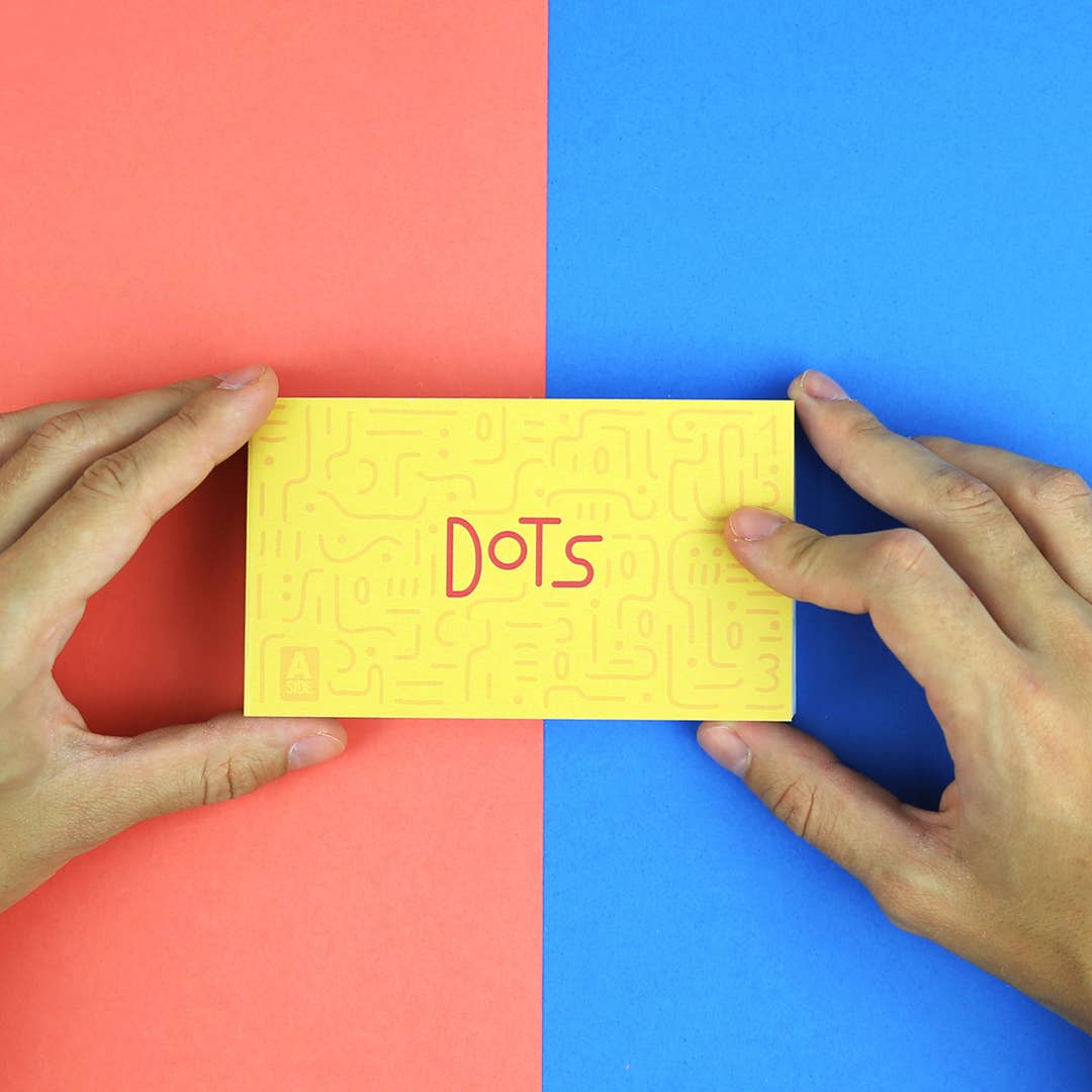 Zwei Bände Dots und Lines nebeneinander als geometrisches Puzzle-Flipbook-Set